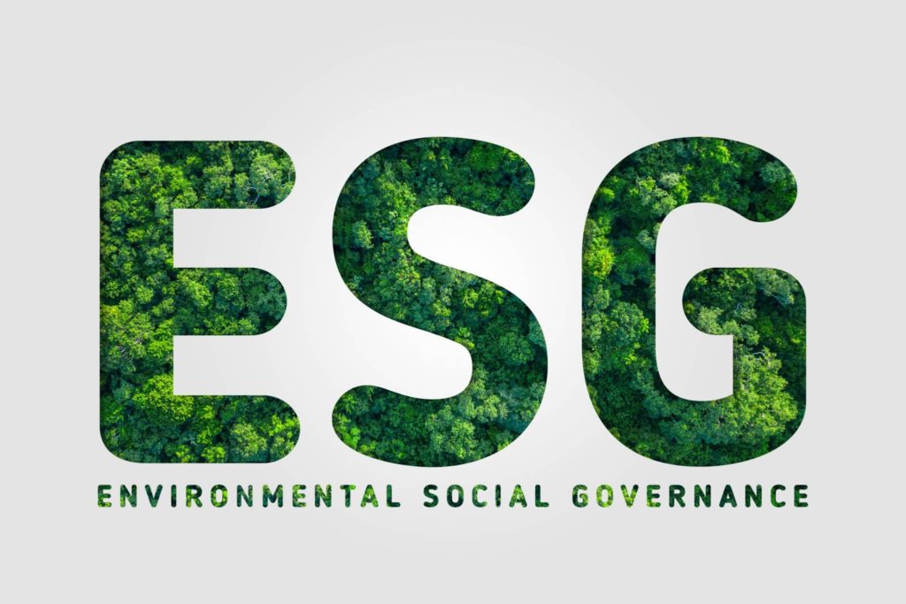 Image illustrating ESG (Environmental, Social, and Governance) principles with icons representing sustainability, community engagement, and corporate ethics. Sustainable ITAD